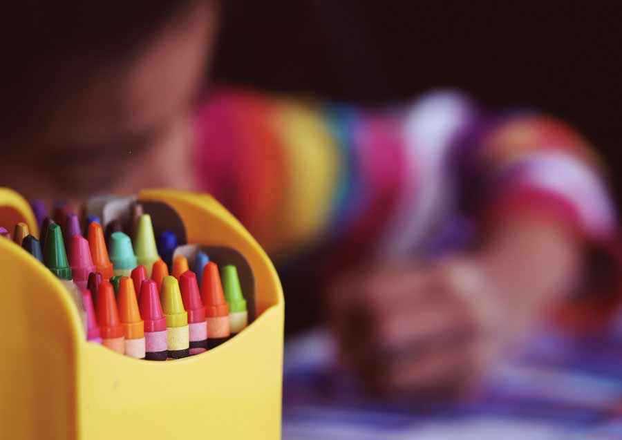 child-drawing-with-crayons